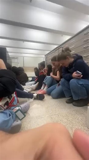 Petrified Brown students can be seen cowering in a university library as loud bangs thunder outside, in exclusive video obtained by The Post. | New York Post