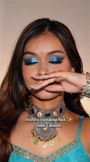 @looks_by_anushka on Instagram: "Effortless Eyemakeup Hack for Navratri 🦚 Follow @looks_by_anushka for more✨ #makeuplover #makeup #makeuptutorial #makeupaddict #eyemakeup #eyemakeuphacks #makeuphacks #trendingreels #bhfyp #navratrimakeup #navratrieyemakeup #navratri #explore #eyemakeupideas"