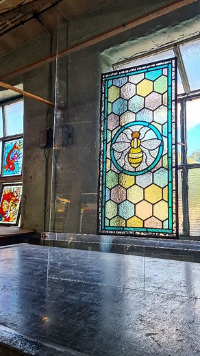 The final part of the stained glass bee reel I made a week or so ago 🤩. The first part was all about the glass cutting and leading together. In this part i'm cementing the window to make it strong and weatherproof. My work is made in the exact same leaded method as all the old church and cathedral windows around the 🌍 Here's the little bee window finished in all her glory. 💙❤️💜💚💛 ... #slowmade #stainedglassartist #glassart #vintagelove #vintagedecor #glasswork #stainedglasswindows #craftsm