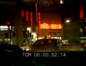 Kenmore Square nightlife in April, 1985: Narcissus nightclub and Lynch's liquor store (cameraman with the Boston police.) | GBH Archives