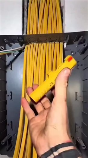 Brillianttechmech on Instagram: "The Art of Electrical Cable Management! ⚡📐 This isn't just wiring; it's a masterclass in precision and organization. Watch as a skilled electrician transforms a complex bundle of cables into a flawless distribution board. Process Highlights: Sorting & Routing: The wires are meticulously straightened and routed to their specific zones. Wire Ferrules (0:15): Notice the small metal tips crimped onto the wire ends before connection? These are called ferrules. They p