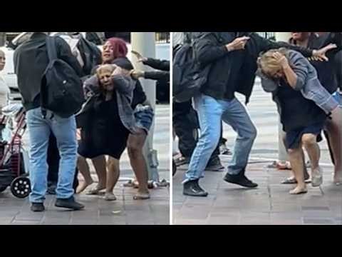 Woman charged in brutal attack on street vendor in downtown LA