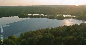 Floating solar panels cell platform system park farm on lake is an alternative clean alternative renewable electricity source