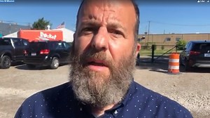 VIDEO: White entrepreneur spits on Black security guard, later charged with assault
