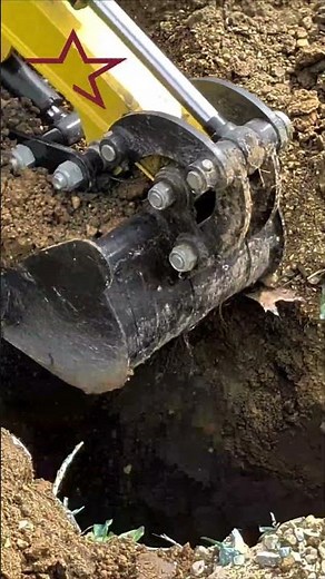 digging pergola footings with the mini excavator | from the bench