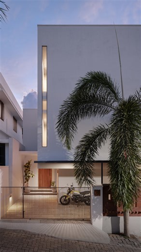 ArchPro on Instagram: "Built on a tight 4-cent corner plot in Kochi, this residence is a response to extreme spatial constraints and local setback regulations. With only a narrow footprint to work with, the design team saw an opportunity—not a limitation—to explore how tropical modernism could thrive in dense urban conditions. Completed in just 9 months, the two-storey home maximizes space through vertical layering and strategic cantilevers that reclaim volume lost to setbacks. Floating upper fl