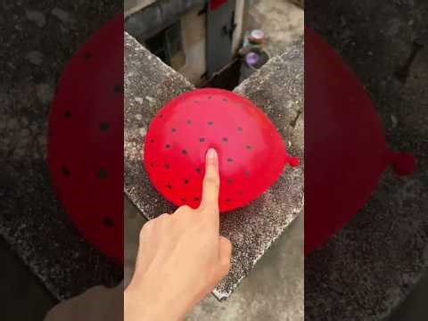 Experiment: Will a water balloon explode if it rolls down from a tall building? 💥🎈 #balloon