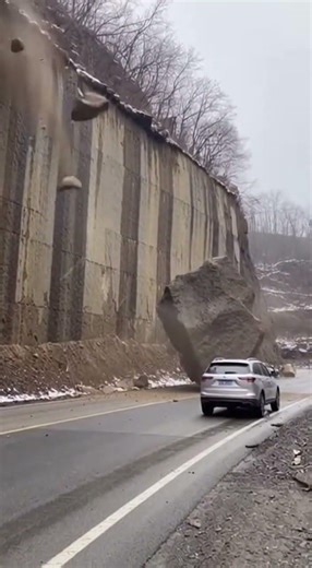 Massive Boulder Falls Off Cliffside Onto Road
