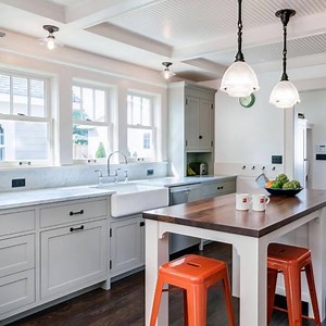 A bigger, brighter kitchen. A more open floor plan. Plenty of built-ins. The owners of this 1900s bungalow planned an ambitious renovation – and it paid off! Which update is your favorite? A.) The farmhouse-style kitchen B.) The new front porch C.) The storage-friendly open foyer zlw.re/eold9976 | Zillow