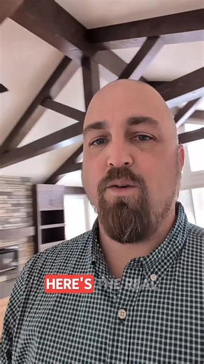 This 1,000 sq ft master suite addition in Wilsonville, Norfolk County was built to feel like a private retreat. The bedroom opens into a boutique walk-in closet. A pocket door slides seamlessly into the wall. And behind it? A spa-inspired master ensuite that completely transforms the space. Slate-look tiled walls. A custom shower niche. Handheld and rainfall showerheads. Natural stone-style floor tile, perfectly sloped to center for proper drainage. This is not just extra square footage. This is