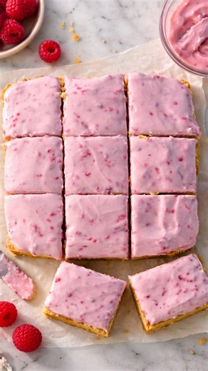 Abby on Instagram: "Vanilla Protein Sheet Cake with Raspberry Frosting ✨ Super moist vanilla cake bars (gluten free!) made with simple ingredients like almond flour, eggs, sweetened with maple syrup and boosted with vanilla protein powder! The tangy and sweet greek yogurt raspberry frosting is absolutely delicious. Perfect for a healthier Valentine’s Day treat! COMMENT ‘cake’ and I’ll send you the full recipe straight to your DM! Here’s what you need: Bars 4 tbsp coconut oil or butter, melted 2