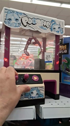 working POOPSIE claw machine .junk store find. check it out!