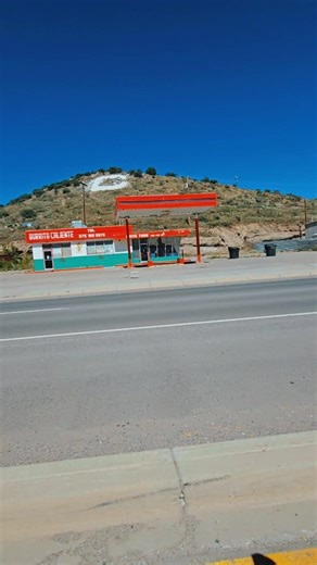 Bayard, NM. drive - Drivers side window view. . . . . . #silvercitynm #NewMexico #driving #miningtown #chinomine | The Mimbres Kokopelli