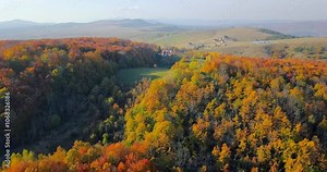 Aerial nature autumn landscape flight over picturesque hills mountains forests meadows