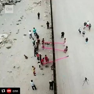 ♥️ Maybe there's some hope for humanity, after all. #Repost @cnn (@get_repost) ・・・ These neon pink seesaws were installed across the US-Mexico border to allow children on both sides to play together. The “Teeter-Totter Wall,” which straddles the steel fence between Sunland Park, New Mexico, and Ciudad Juárez, Mexico, was built by two professors who designed the concept as part of a book to “reimagine, hyperbolize or question the wall and its construction, cost, performance and meaning,” accordin