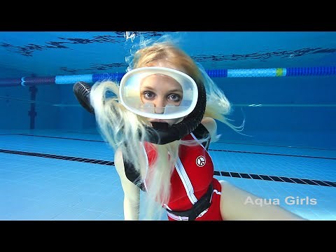 Red Swimsuit Scuba Girl Underwater in Pool.