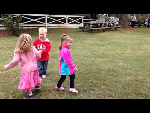 Preschool kids playing tag