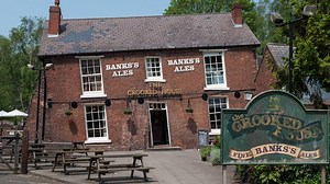 Fire rips through historic Crooked House pub days after sale to private buyer