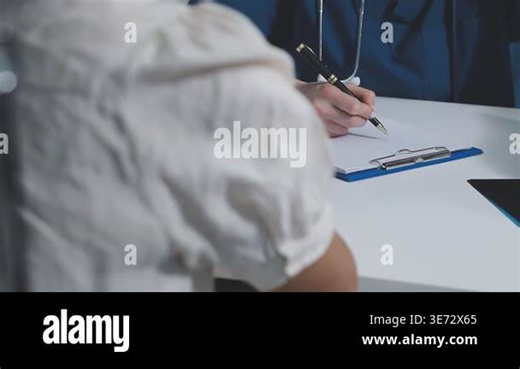 woman holding a pen Stock Video Footage - Alamy