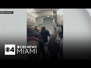 Passenger describes moments when man attacks attendant on Miami-bound flight, swallows rosary beads