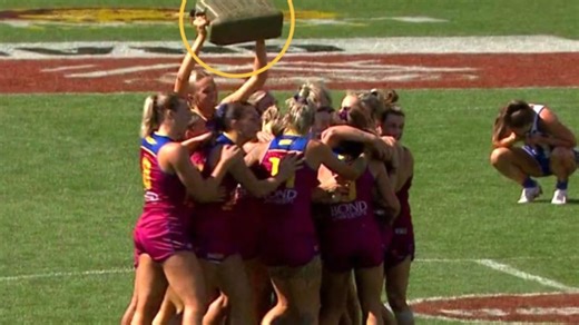 Brisbane celebrate after winning the AFLW grand final