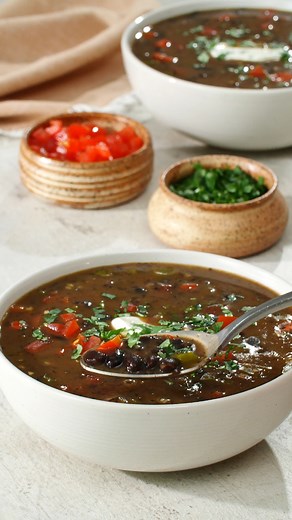 Warm up on a chilly fall day with this flavorful Chipotle Black Bean Soup. Made with authentic GOYA® Chipotle Peppers in Adobo Sauce and creamy GOYA® Black Beans, it's easy to recreate the delicious taste at home. Who's ready for a bowl? Chipotle Black Bean Soup: https://brnw.ch/21wO74X | Goya Foods