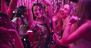 Dancing, friends and night with women in club for new years eve party, celebration and concert