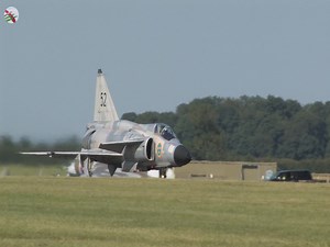 The Saab 37 Viggen from the Swedish Air Force Historic Flight was a highlight at the RAF Waddington International Airshow in 2013. The Viggen, registration SE-DXN. The Viggen's appearance at Waddington was part of the aircraft's ongoing celebration and preservation by the Swedish Air Force Historic Flight. This organization ensures that historic Swedish military aircraft like the Viggen remain airworthy and continue to perform at airshows around the world, keeping their legacy alive for new gene