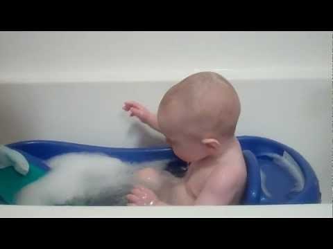 6-month-old Baby C Splashes in the Bathtub