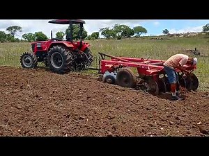 4 tractors cutting land in the red clay in Riacho PB
