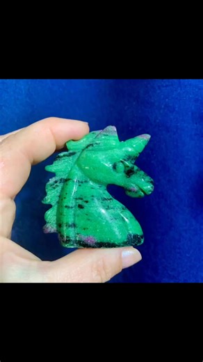 Ruby in zoisite (UV reactive) unicorn! This stone is extremely helpful with soul healing, past life work, and spiritual learning. Ruby in zoisite is unique, promoting individuality while at the same time retaining interconnectedness with humanity. It energises, balances, and encourages passion for life. | Magick Potions