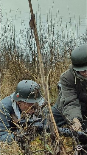 Wehrmacht soldiers reloading a MG-34 machine gun. Reenactors #ww2