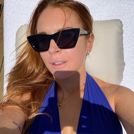 Lindsay Lohan Looks Totally Grool in Blue Bikini on Trip After Bader Shammas Wedding
