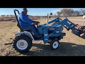 Ford 1220 Tractor w/ 7106 Loader