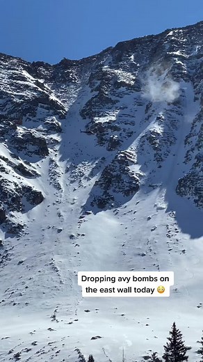 This helicopter dropped a bunch of bombs on the east wall triggering several small avys. What a cool show #avalanche #helicopter #ski #snowboard #bomb