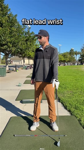 A flat lead wrist at the top of the backswing help us orient the clubface to the ball sooner, making it one of the first solutions to golfers who swing with too open of a face and hit shots right. #golf #golftips #golfswing #golfer #golftiktok