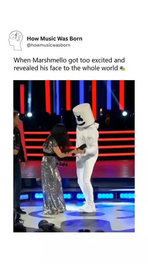 How Music Was Born on Instagram: "When Marshmello got too excited and revealed his face to the whole world 🎭 The mystery of Marshmello reached a fever pitch at the 2018 iHeartRadio Much Music Video Awards when the DJ appeared to finally reveal his identity. As the helmet came off, the crowd erupted, only to realize they had been brilliantly trolled. Underneath the bucket was actually Shawn Mendes, wearing a matching white suit and a massive grin. The stunt was perfectly timed, playing on the in