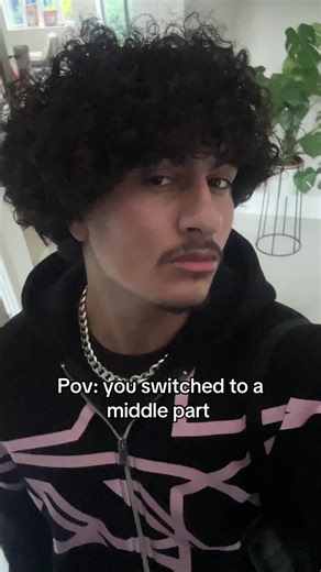 Should I Switch to a Middle Part for My Curly Hair?