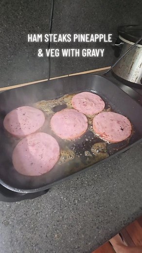 Ham Steaks with Pineapple and Vegetables in Gravy