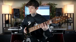 Polyphia’s Tim Henson demonstrates jaw-dropping ‘God Hand’ 8-string slapping riff - and teaches you how to play it