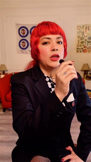 We talk about the origins of the black and white suit in ska fashion, tracing it back to the early 1960s in Jamaica where ska music was born. The sharp, tailored look of the Jamaican dance scene reflected the 'rude boy' style, with suits, thin ties, and polished shoes being a way to demand respect and show pride. When ska was revived in the UK in the late 1970s, the black and white checkerboard pattern became a symbol of racial unity. Bands like The Specials, The Selecter, and Madness made this 