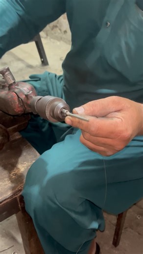 Tension spring making from steel wire on drill #diy #shorts