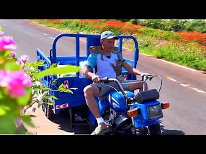Sơn and BiBi were excited to go pick up their new tricycle.