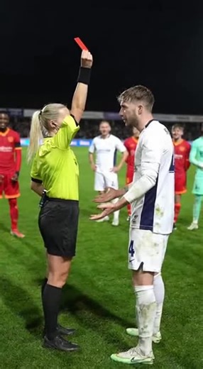 Referee Issues Red Card in Football Match Compilation