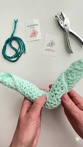 Here’s how to fold a washcloth into a bunny! Find the printable tags here: https://daisycottagedesigns.net/free-printable-tags-for-spring/ | Daisy Cottage Designs