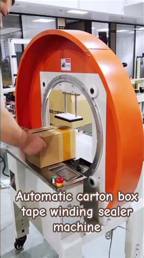 Automatic carton box packing in action through tape winding machine…#machine #packingmachine