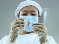 China OKs 1st homegrown vaccine as COVID-19 surges globally