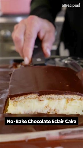 You’ll want this No-Bake Chocolate Éclair Cake for breakfast, lunch, dinner, AND dessert....it’s just that good! 🍰🍫 Get this recipe and two more no-cook desserts in Nicole’s YouTube episode, just in time for Valentine’s Day. Click the link in our bio to watch now! ❤️ Ingredients: 1 (16 ounce) package graham crackers 4 cups milk 2 (3.5 ounce) packages instant vanilla pudding mix 1 (16 ounce) package frozen whipped topping, thawed 1 (16 ounce) package prepared chocolate frosting Line the bottom 