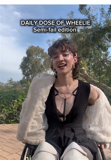 Daily Dose time!!! ✨ Not all are filmed equally 😅✨🫶🏼 Alt text: A woman in a wheelchair does a wheelie while talking to the camera. She goes to back out of the frame and loses her balance for a second but saves it. Captions are on screen for accessibility. #Wheelie #DailyDose #Blooper