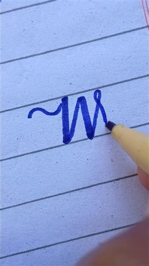 Capital "W" in cursive writing